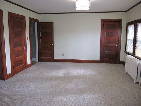 Bedroom with 4 closets