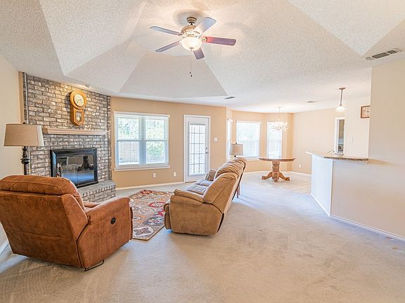 Living Room Open to Dining and Kitchen
