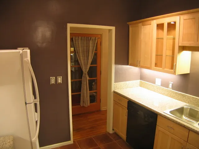 202 entrance and kitchen from interior stairwell.