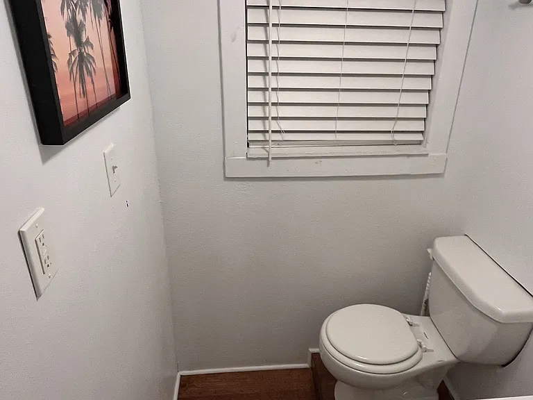 Full bathroom with walk in shower.