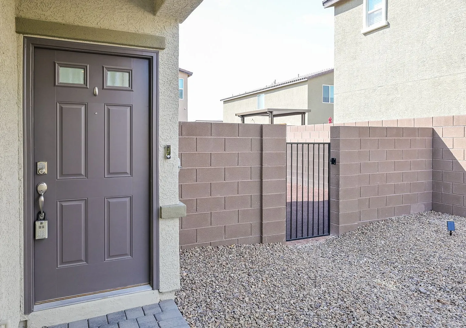 NW!! Gated!! Built 2023 Corner Lot!! Low Maintenance Desert Landscape Front!! Patio & Synthetic G... — Photo 4