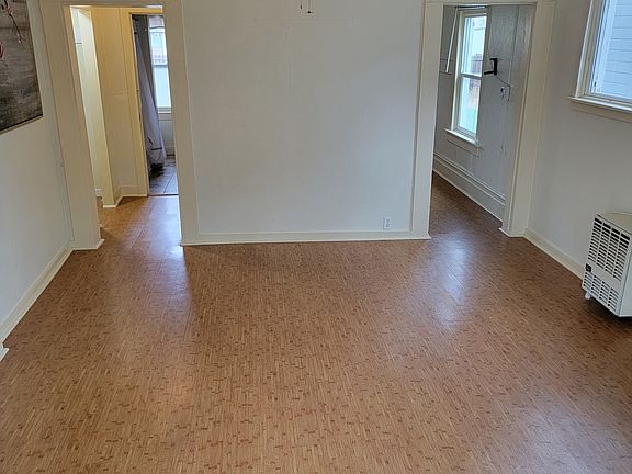Main living area. To the left is the closet and bathroom, to the right is the kitchen
