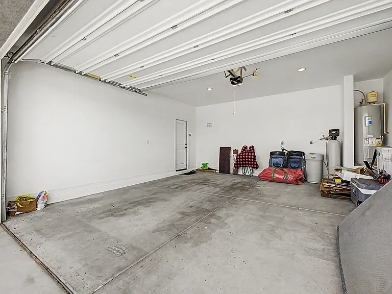 Garage ( 2 Car Spaces + Water Softner)
