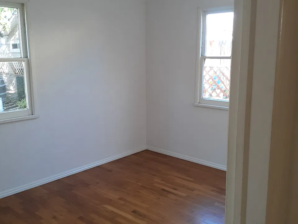 Bedroom 10 feet by 11 feet. It has a walk in closet.