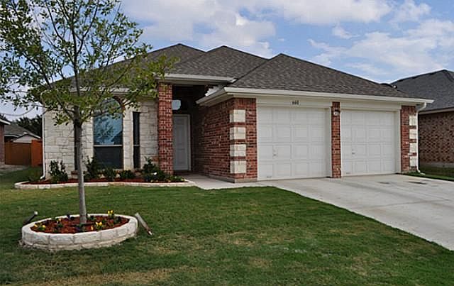 Striking brick & stone front elevation