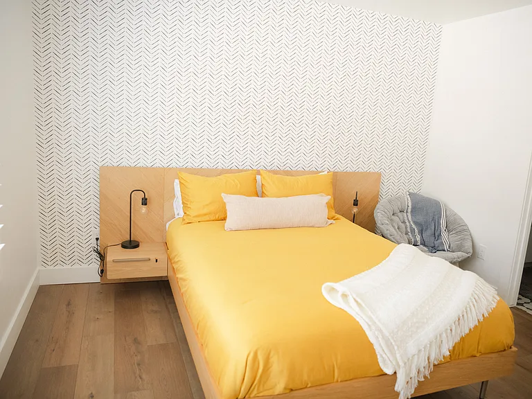 Bonus room with separate entrance is furnished with bed, refrigerator and TV. Includes it's own bathroom & locks