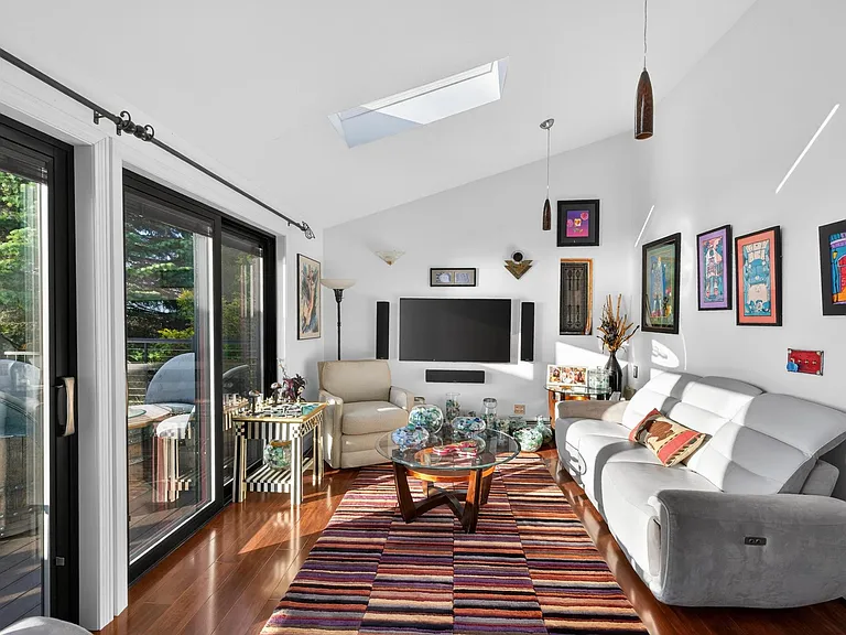 Definitive Technolgy Speakers & Subwoofer drive Surround Sound for 55" Samsung. All sofas are electric recliners.