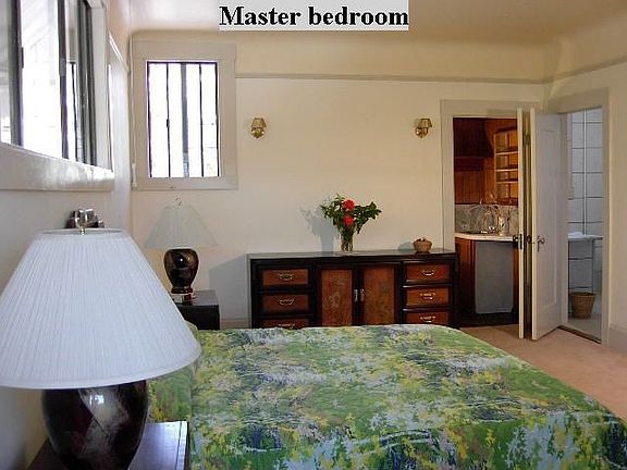 Master bedroom showing powder room and bathroom.