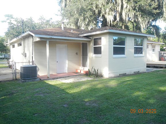 Backyard behind carport
