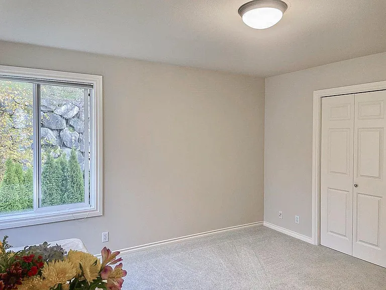 3rd bedroom overlooking backyard.