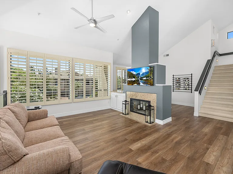 LIVING RM W/ TWO WAY FIREPLACE