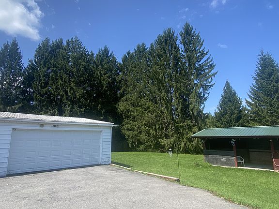 2 car garage, pavillion in yard