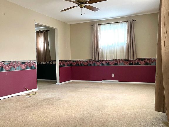 Living room- carpet will be hardwood floor