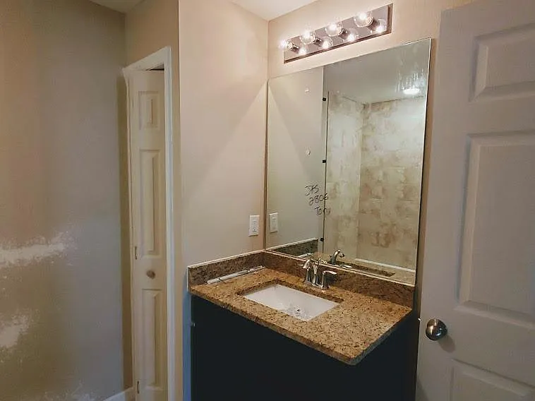 main bath single granite vanity