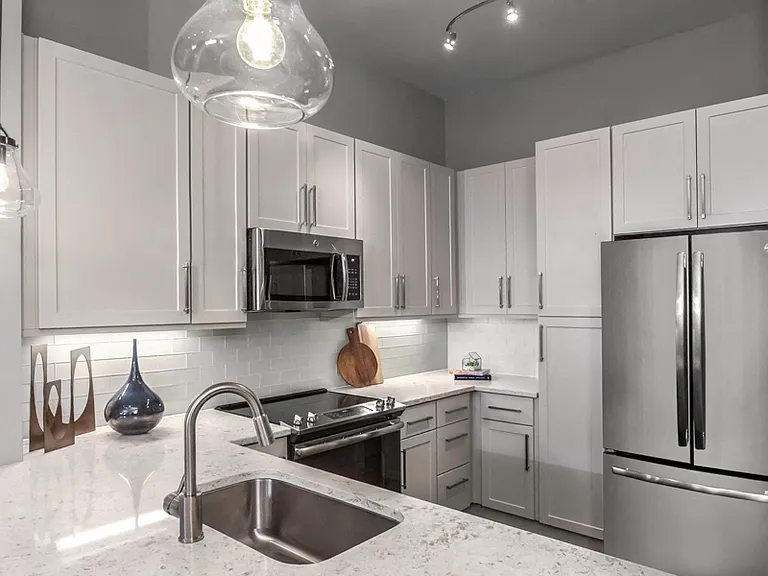 Premium quartz countertops with subway tile backsplash