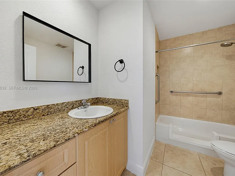 7515 NW South River Dr — Photo 10