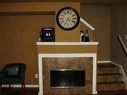 Lovely fireplace and custom paint finishes throughout