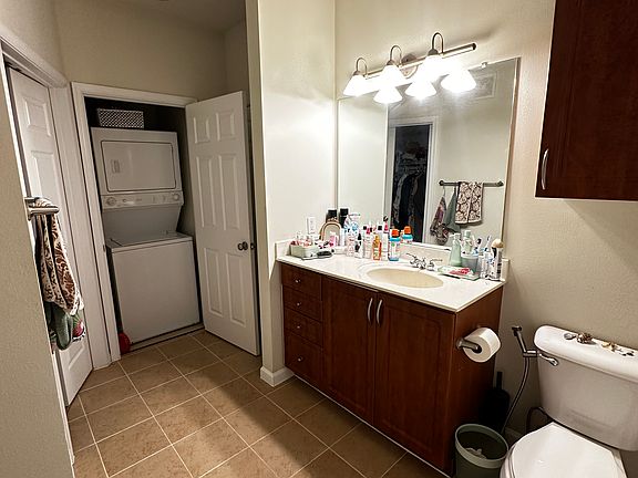 Vanity, toilet & washer & dryer