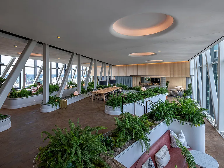 Gather with friends and neighbors on the Skybridge complete with a shared kitchen and plenty of seating for remote work