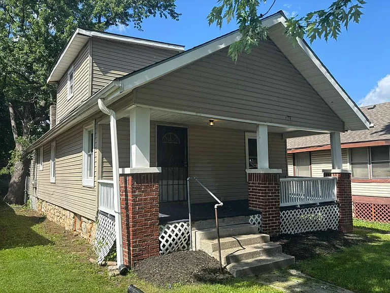 1850 E 68th Ter — Photo 1