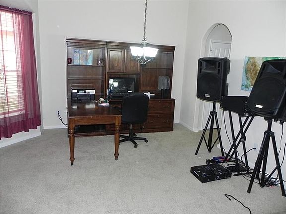 Dining or formal living room a the front of the home.
