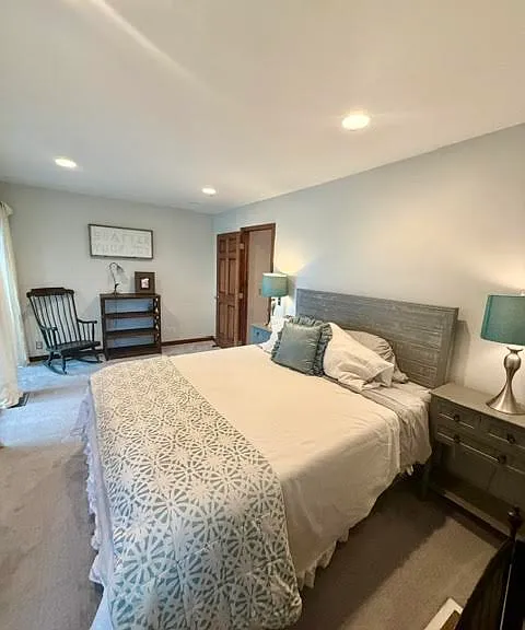 Second Story Primary Bedroom with Queen Plus Bed, Walk-In Closet, balcony and Gas Fireplace.