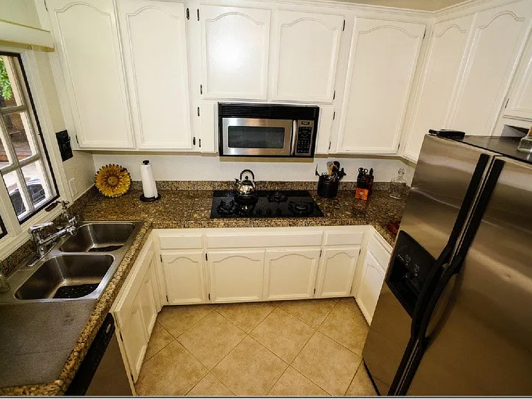 Kitchen, stainless steel appliances, brand new cooktop