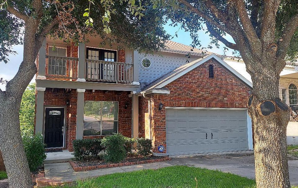 GREAT STREET APPEAL. SHADED FRONT YARD. COVERED FRONT PORCH AND UPSTAIRS BALCONY