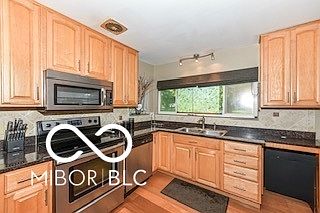 3rd image of 4930 E 78th St