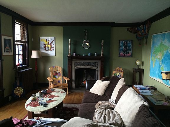 Large living room with original woodwork