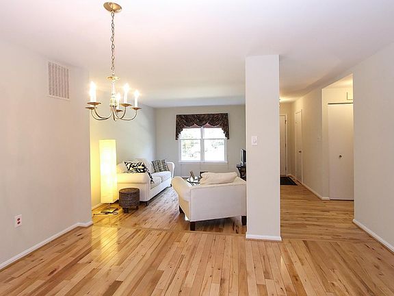 View of family room and front hallway from the dining room