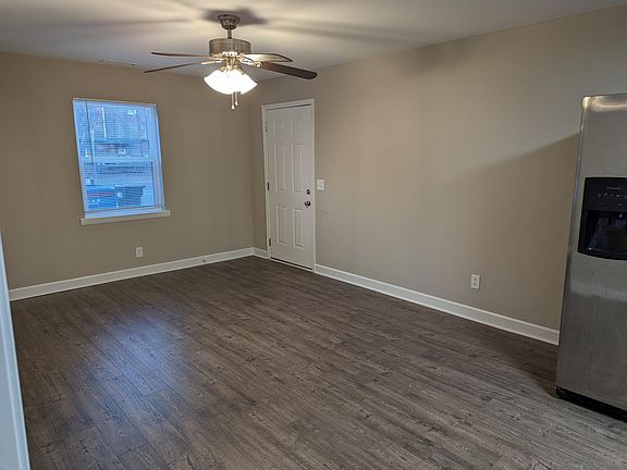 Another angle of the living room, looking back towards the front door.