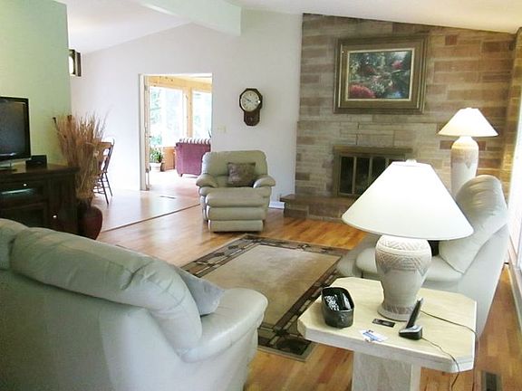 Spectacular living room with a fireplace for those chilly days.