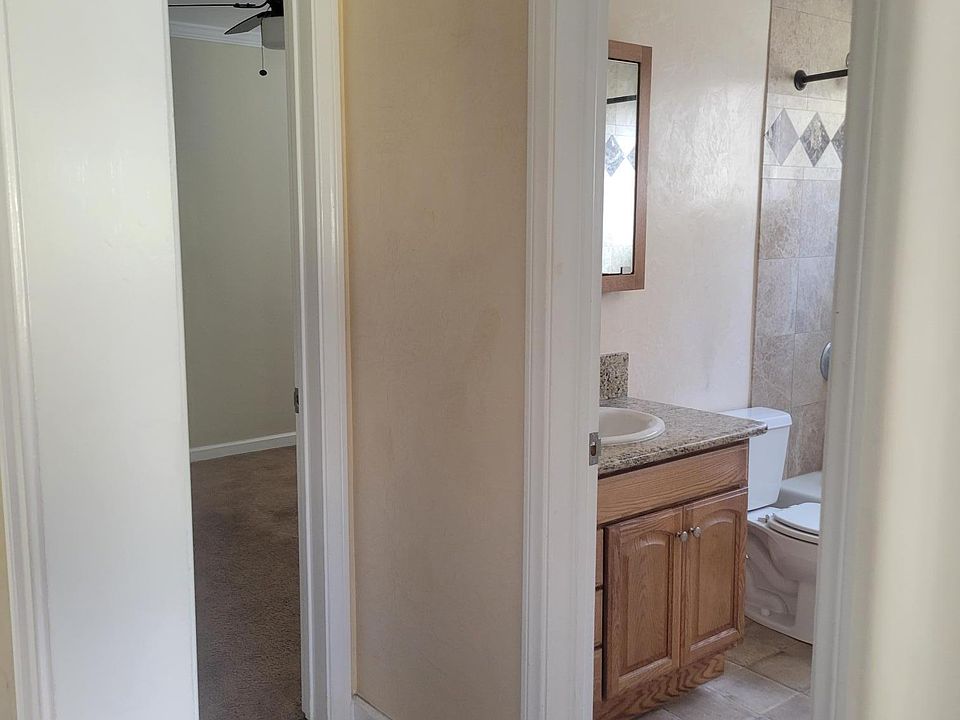 hallway looking into bathroom