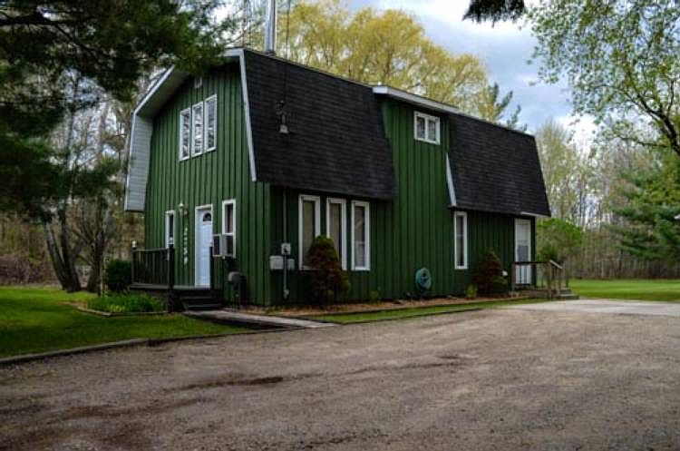 COUNTRY LIVING CLOSE TO TOWN! This well-maintained 3 bedroom, 2 bathroom home is move in ready today.  Situated on an acre just north of Monroe in Larkin Township with a detached garage, partially fenced yard, shed, fireplace, two decks, this affordable priced home can be purchased with 100 rural development financing. Don't wait, call today for your own private showing!