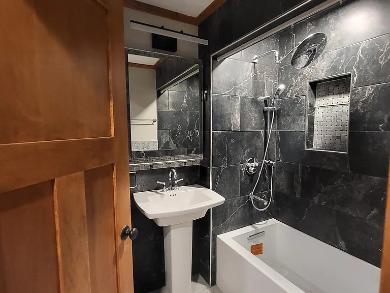 Newly renovated bathroom in 2025 with deep soaking tub