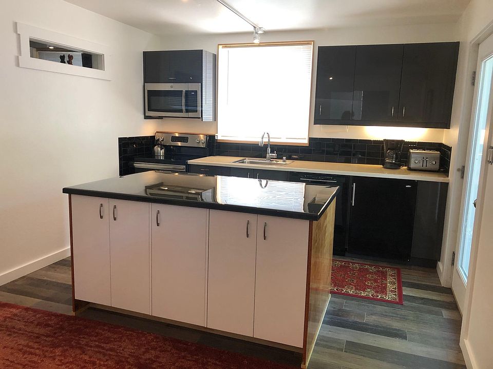Large modern kitchen with new appliances, LED lighting, ample cabinets and counter space