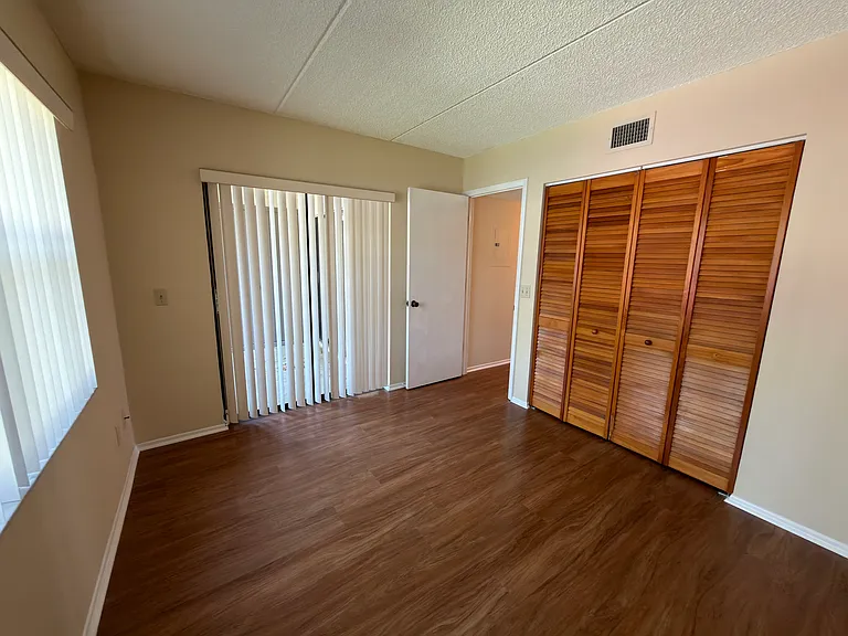 second bedroom with access to the front patio