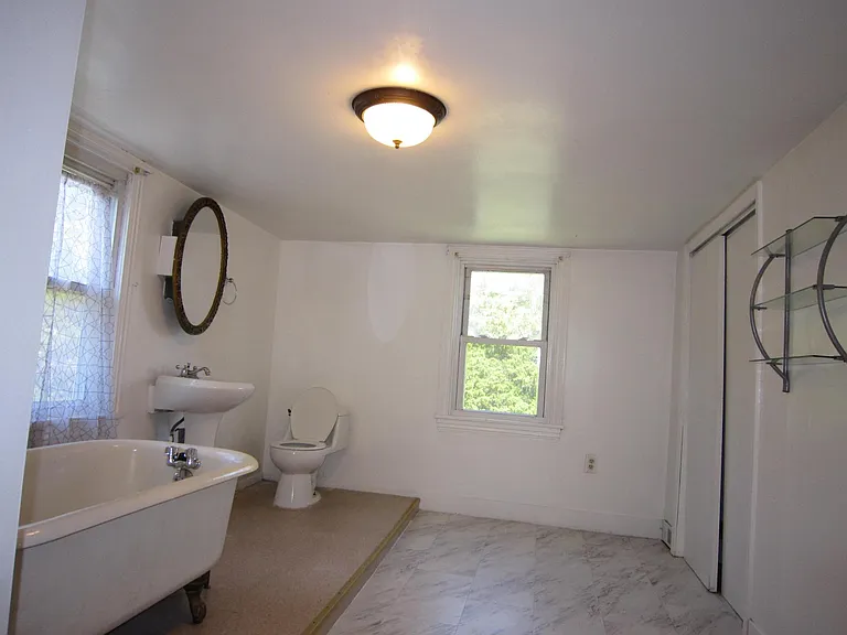 Extra Large Bathroom with shower and bathtub