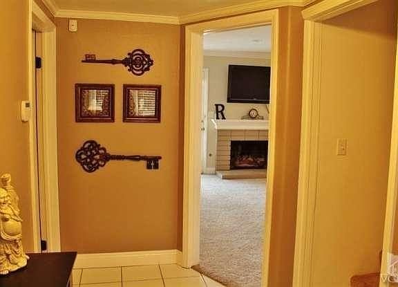 Three doors lead to four different suites. This home has many possibilities.