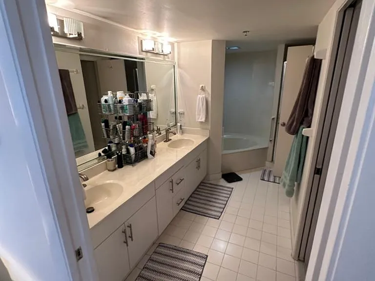 master bedroom with tub and shower,