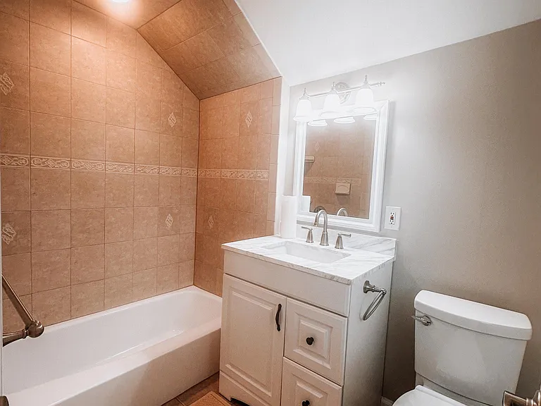 2nd floor full bath. Tub/shower. completely renovated