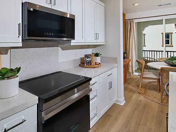 Kitchen
Easily create chef-inspired meals with solid countertops and abundant cabinetry storage