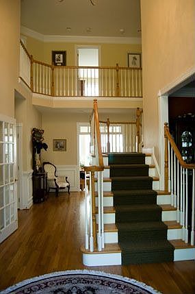 Two Story Foyer with Front and Back Stairs