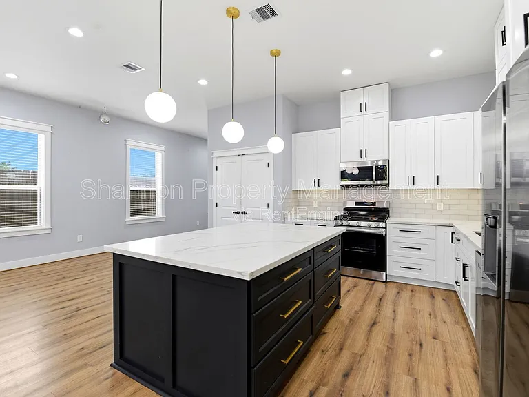 6476 T C Jester Blvd — Photo 10