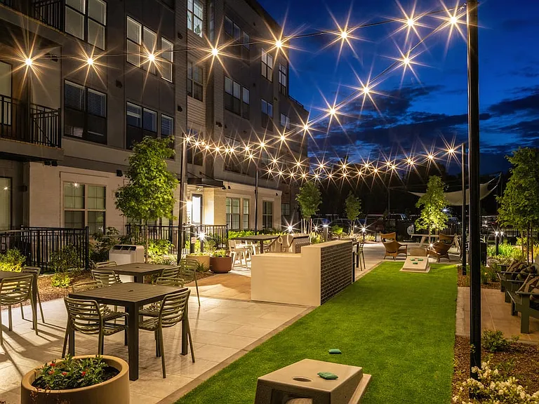 2 Campus courtyard with cornhole and picnic areas