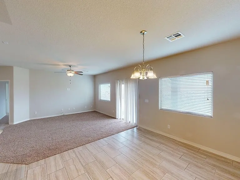 Open Plan Living - Sliding Door to Back Entry