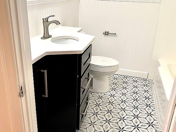 Hall bathroom; custom tile.