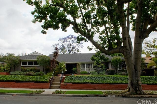 Rare Find... 5 Bed 3 Bath Custom Built Single Level Pool Home on Tree Lined Street in Whittier's Prestigious Historic District.