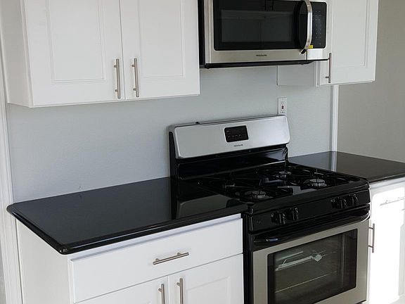 Beautiful Kitchen Cabinets with Top quality granite and stai